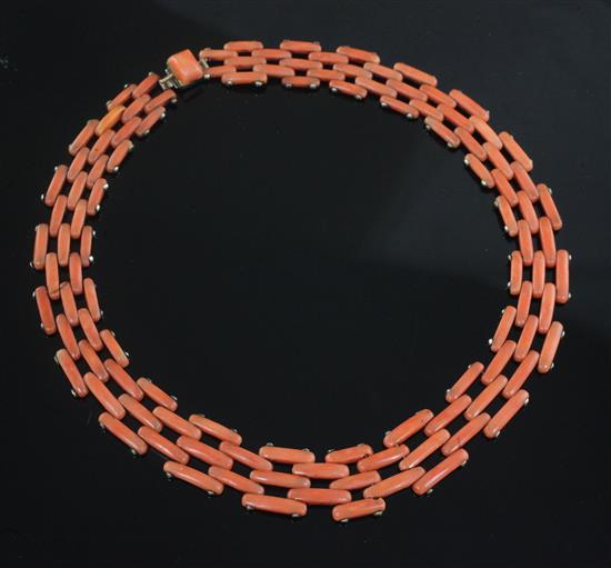 A gold and coral gate link choker necklace, 37cm.